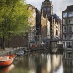 Historic Buildings and Canal in Amsterdam